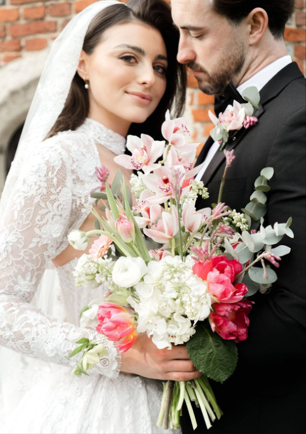 Bride holding a bespoke B's Blooms wedding bouquet