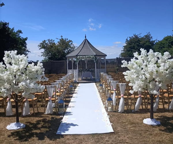 Ceremony and venue flowers for an Essex wedding by B's Blooms