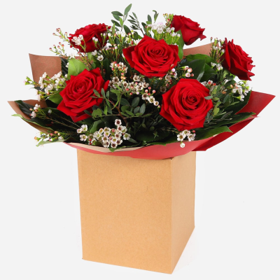 True Romance - A beautifully hand-tied bouquet featuring fresh red roses.